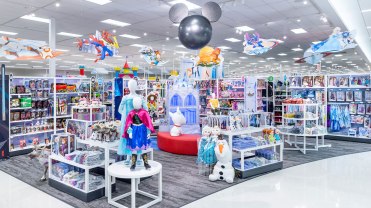 The lead image shows a Disney display in a Target store.