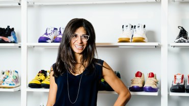 The header image shows Deena Bahri posing in front of a shelf of sneakers.