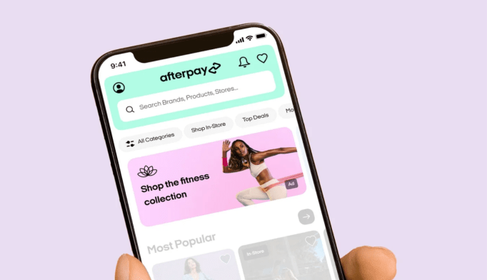 The header image shows the Afterpay app open on someone's phone.