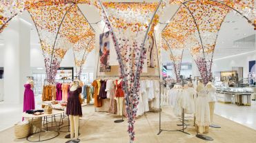 The header image shows the inside of a fashion store.