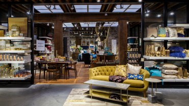 The lead image shows the inside of a Williams Sonoma store.