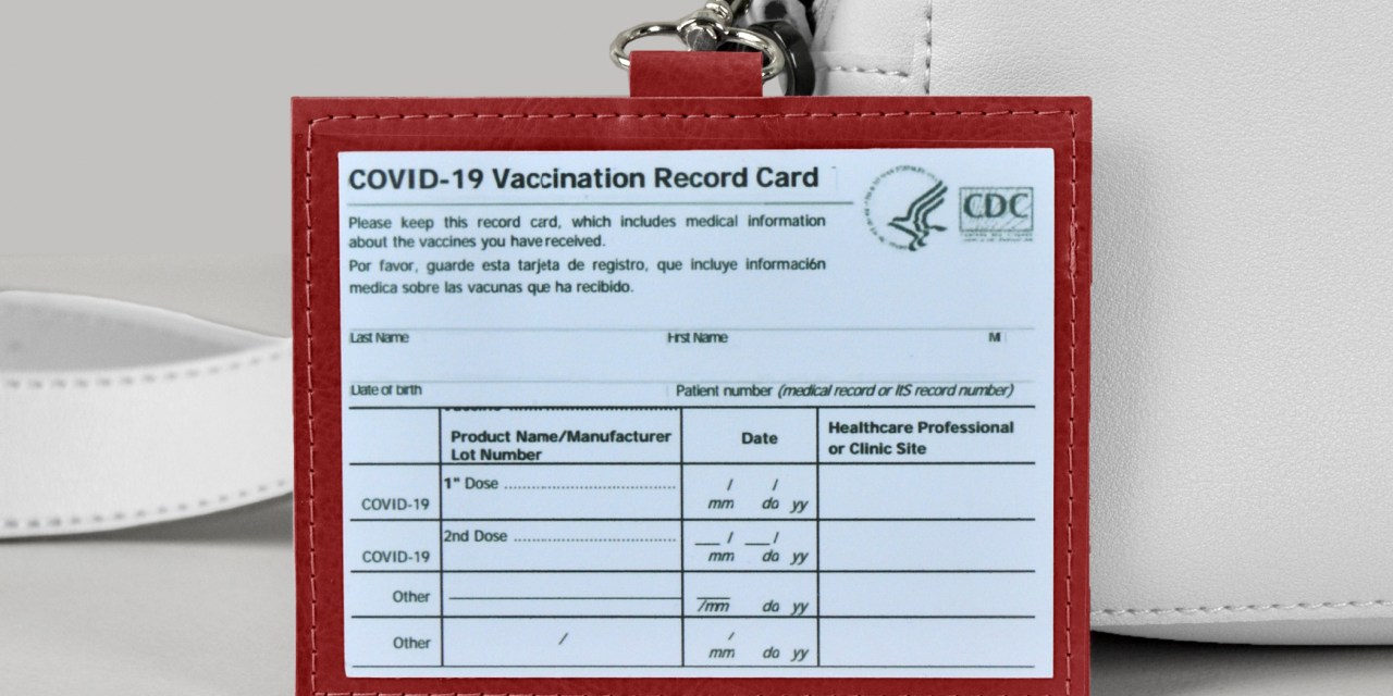 The lead image shows a vaccine card holder.