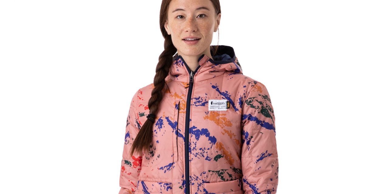 Female model with braided hair in pink Cotopaxi jacket