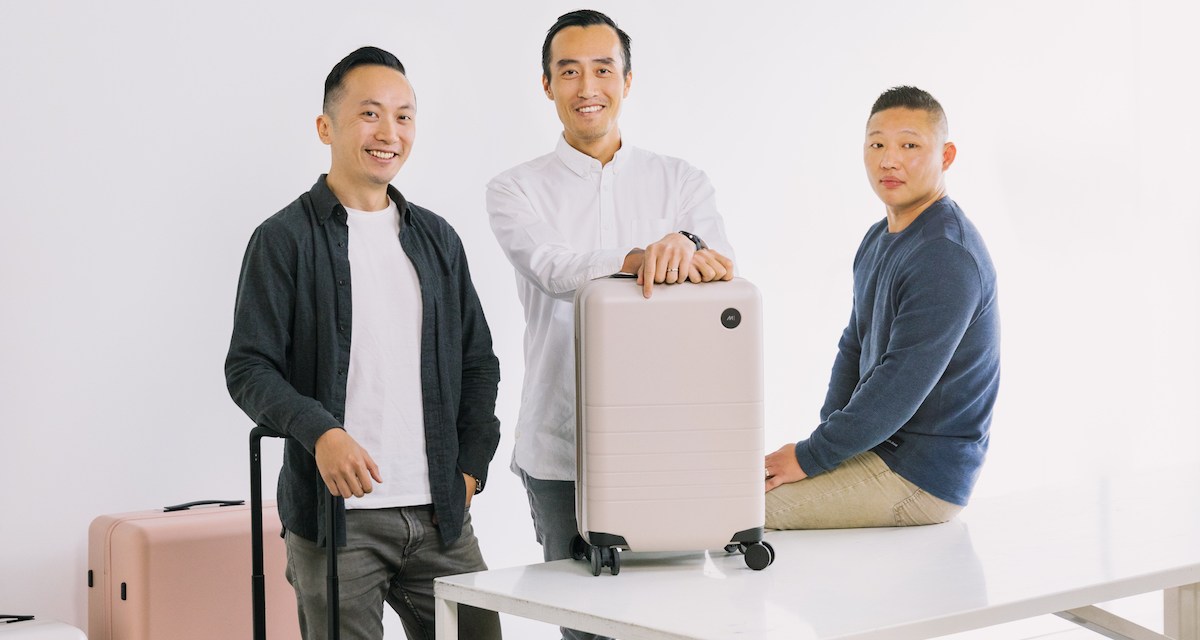 The co-founders of Monos show off their luggage