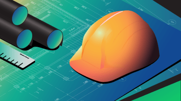 Hard hat on top of blueprints