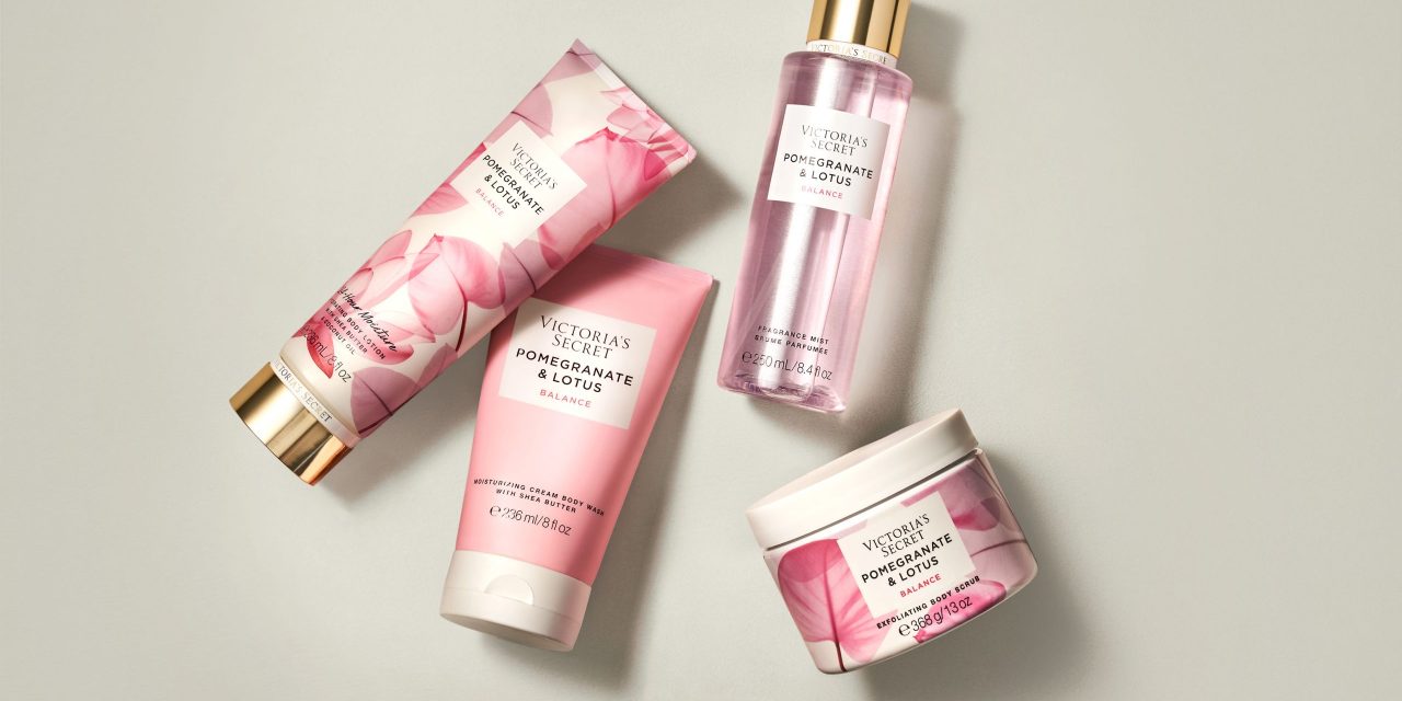 Victoria's secret beauty items on a tan background