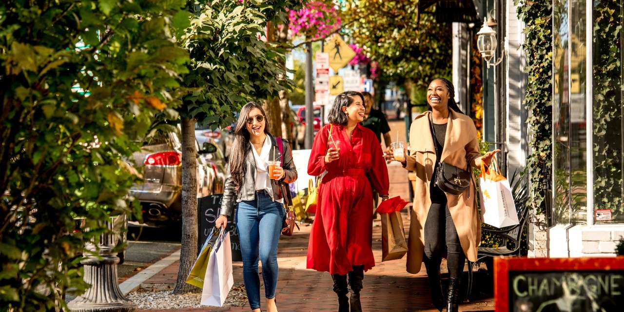 Three women shopping in the Georgetown neighborhood