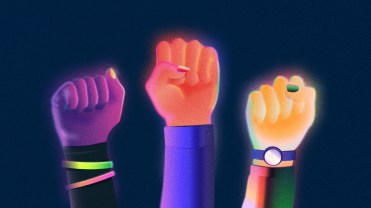 Three fists raised in solidarity with brightly colored nails on a dark navy blue background