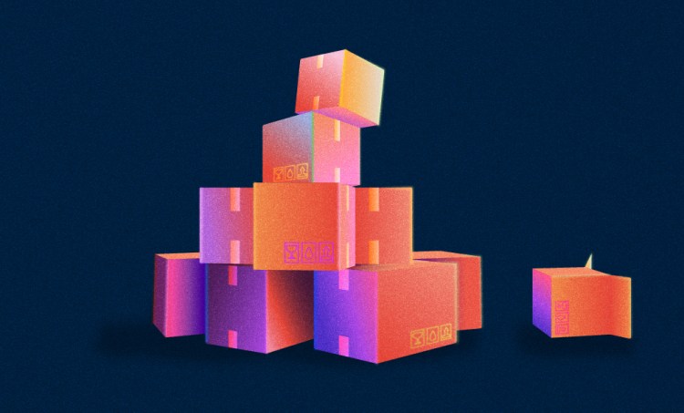 cardboard boxes stacked high in a pile on a dark navy blue background