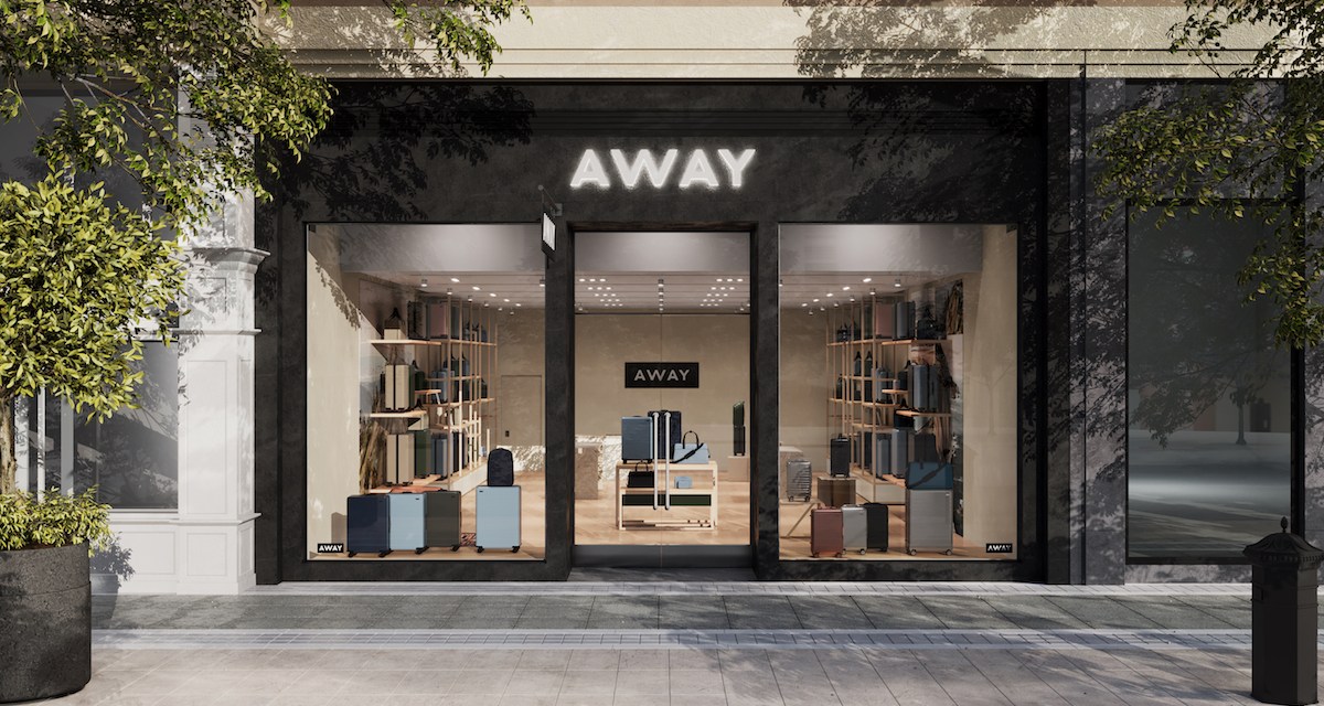Away-branded storefront with luggage on display