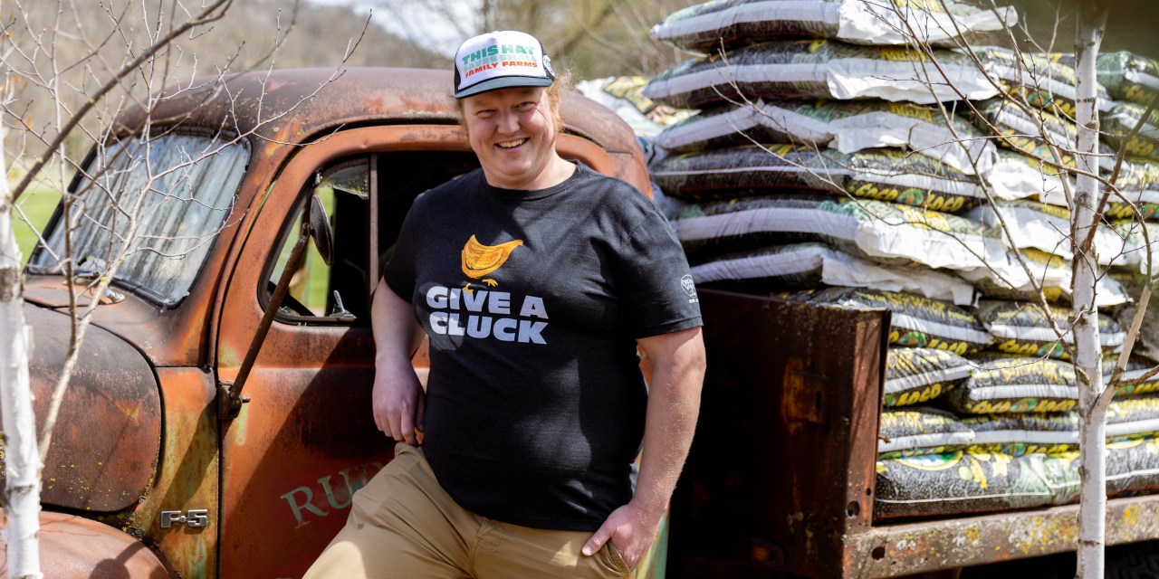 A farmer wearing Organic Valley's merchandise.