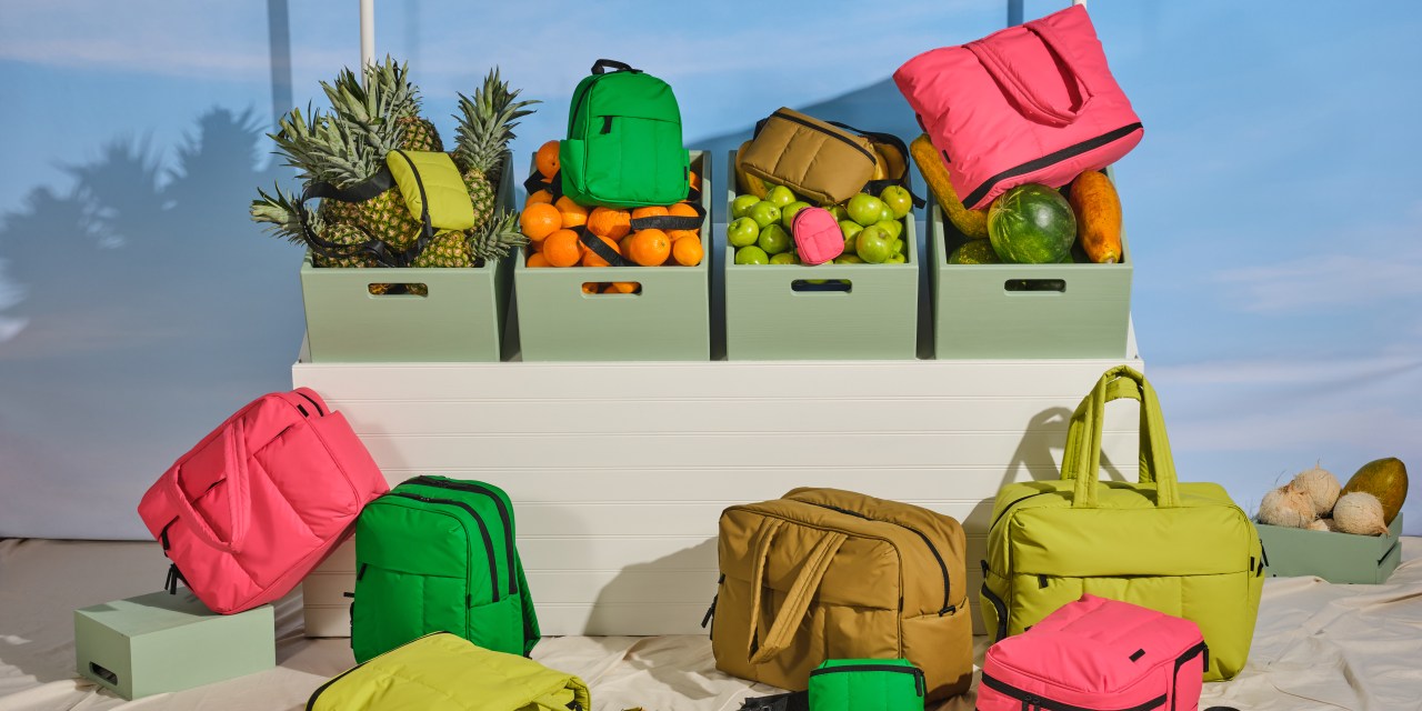 Calpak's duffel bags and backpacks in pink, green and brown colorways.