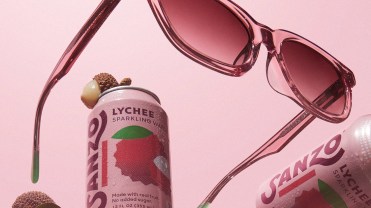 Sanzo's lychee flavor alongside pink sunglasses.