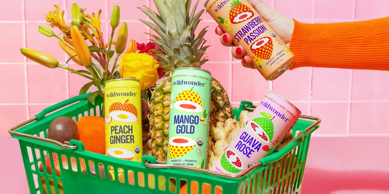 Wildwonder's products in a shopping basket with fruits.