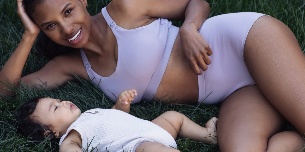 Bravado Designs's new intimates on a mom next to a baby.