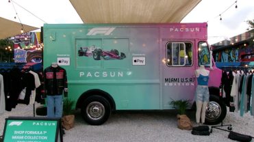 A green and purple-colored Pacsun-branded truck
