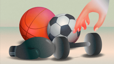 An outstretched hand reaches for a bunch of fitness equipment, like a basketball, soccer ball, boxing gloves, and weights