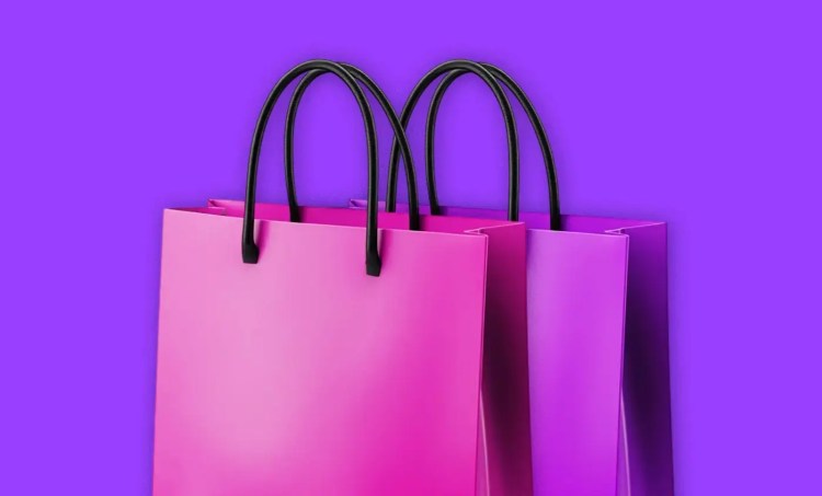 Purple shopping bags on purple background