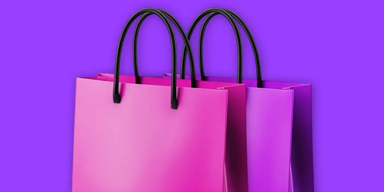 Purple shopping bags on purple background