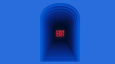 Dark archway with the word 'Exit' written in all caps in the middle.
