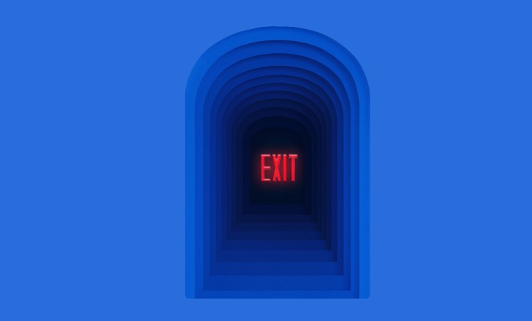 Dark archway with the word 'Exit' written in all caps in the middle.