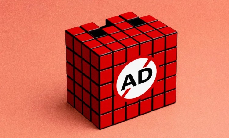 Red rubix cube with the word "ad" written on it sitting on a red background