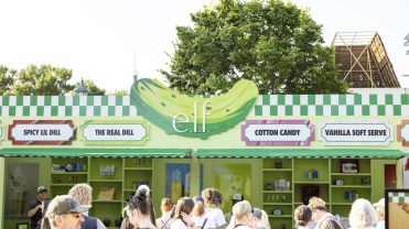 Visitors stop by E.l.f.'s dill-pickle themed booth at the Minnesota State Fair