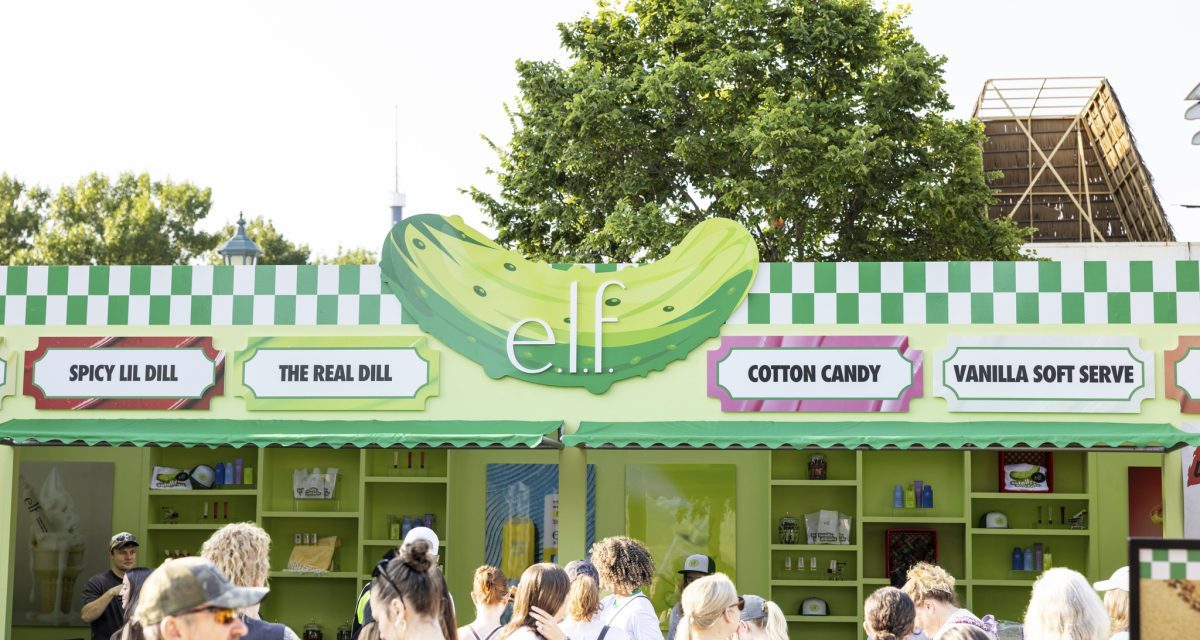 Visitors stop by E.l.f.'s dill-pickle themed booth at the Minnesota State Fair