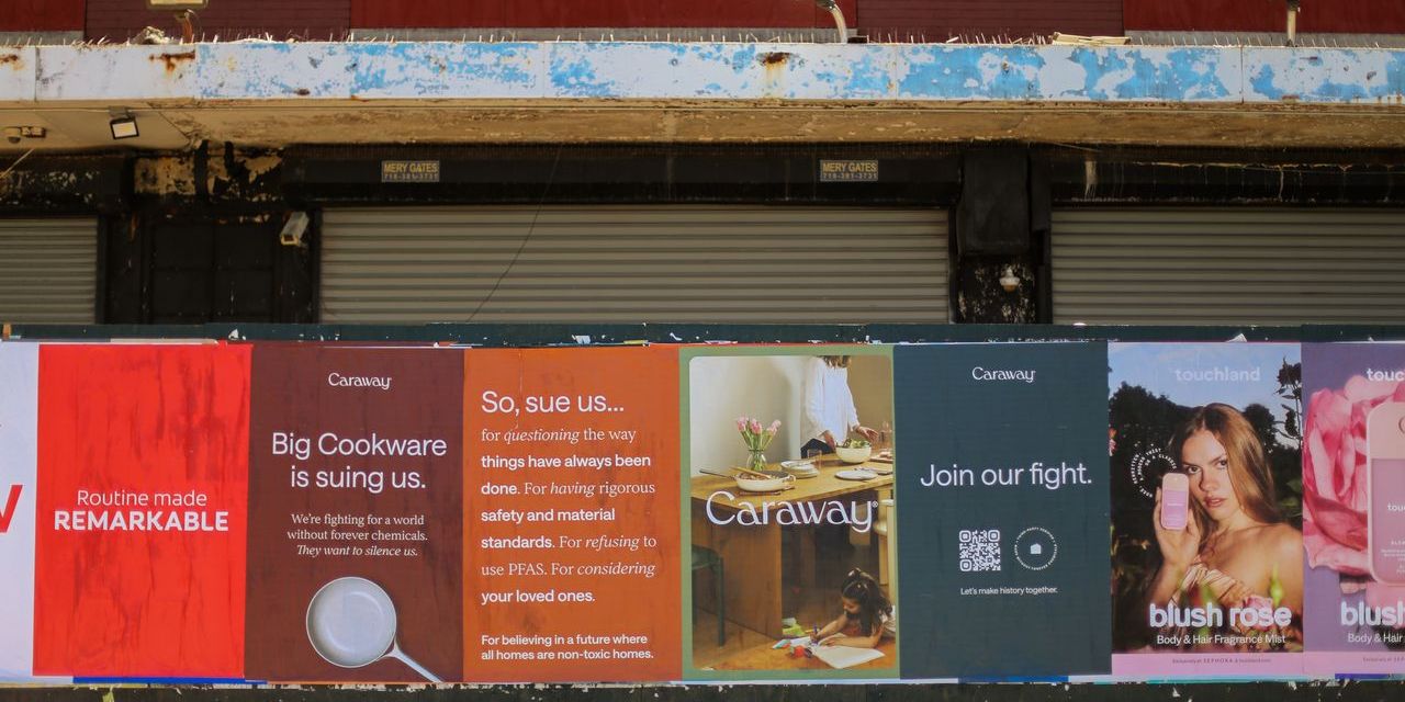 Wild postings on a New York City street corner from the cookware brand Caraway